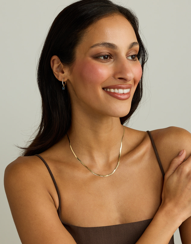 Michael Hill - Australian Sapphire Oval Cut & 0.15 Carat TW Diamond Hoop Drop Earrings in 10kt Yellow Gold with Rhodium