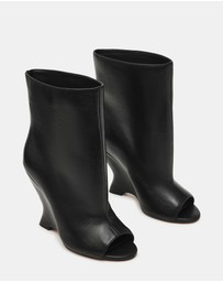 Steve Madden - Relix Black Leather Wedge Booties