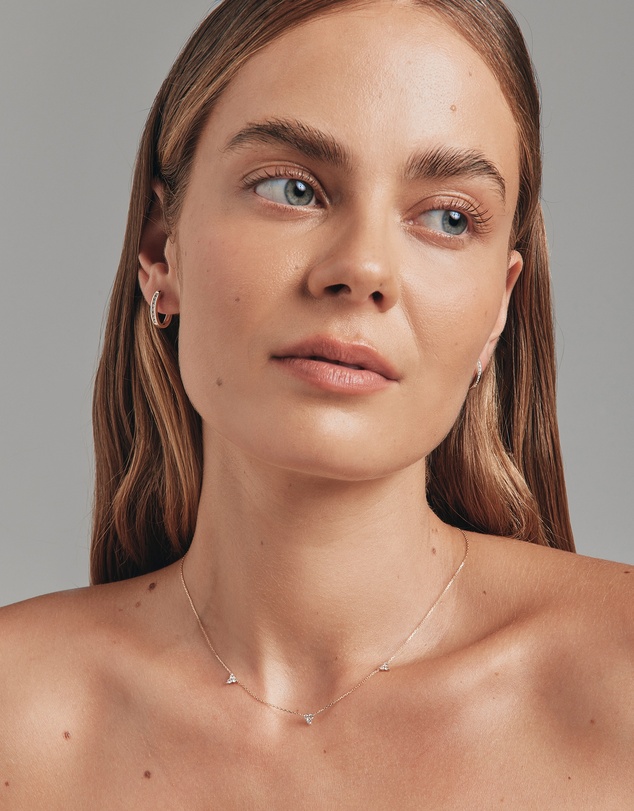 Michael Hill - Huggie Earrings with 0.25 Carat TW of Diamonds in 10kt Yellow Gold