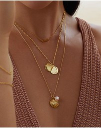 Wanderlust + Co - Seashell Gold Locket Necklace