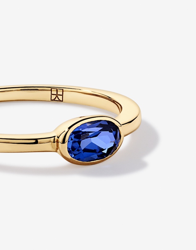 Michael Hill - Oval Blue Created Sapphire East-to-West Set Bezel Ring in 10kt Yellow Gold