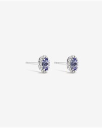 Michael Hill - Oval Cut Blue Tanzanite Gemstone and 0.12 Carat TW Diamond Halo Stud Earrings in 10kt White Gold