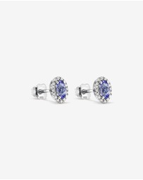 Michael Hill - Oval Cut Blue Tanzanite Gemstone and 0.12 Carat TW Diamond Halo Stud Earrings in 10kt White Gold