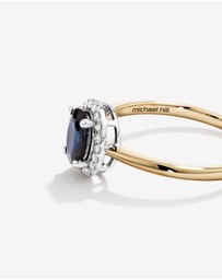 Michael Hill - Oval Cut Blue Sapphire Gemstone and 0.10 Carat TW Diamond Halo Engagement Ring in 10kt Yellow and White Gold