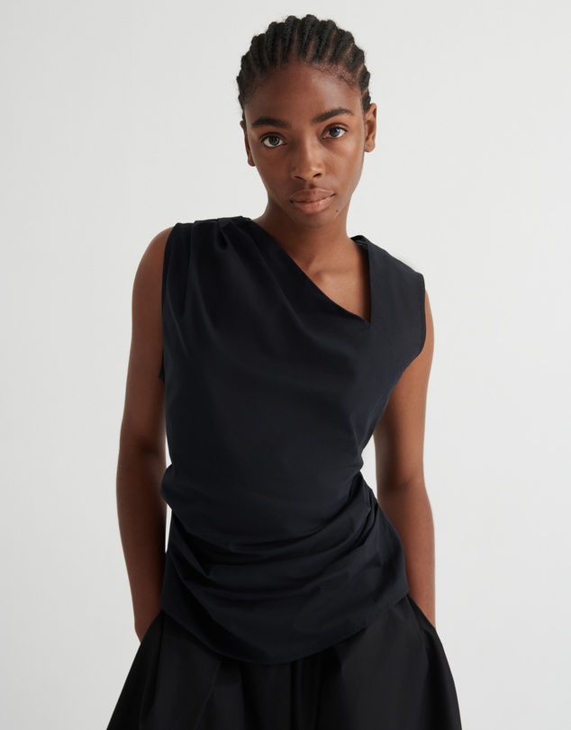 Kowtow - Genre Top