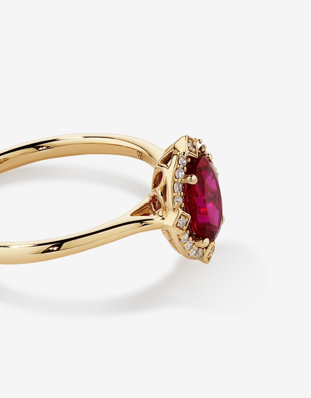 Michael Hill - Oval Cut Created Ruby and Diamond Halo Ring in 10kt Yellow Gold