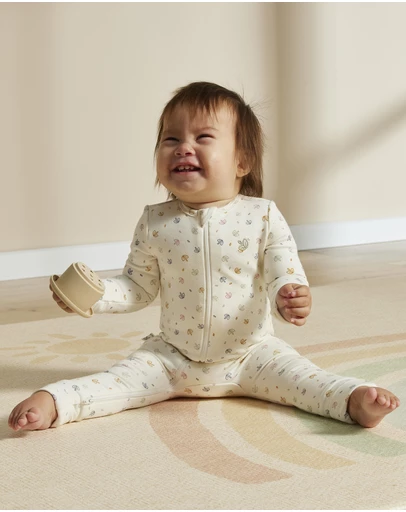 Grow Kindly - Light Zippee Baby Romper in Rainbow Dreaming