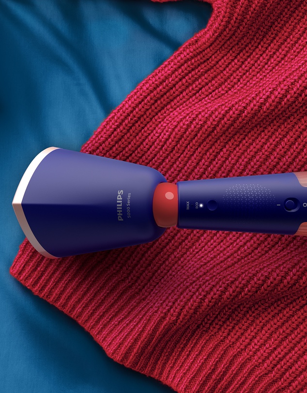 Philips - Stylish Handheld Steamer with portable ironing mat