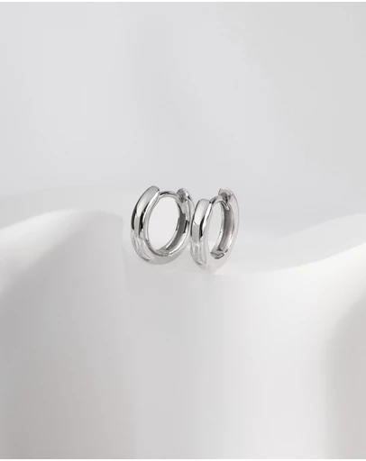 Wanderlust + Co - Classic Silver 7mm Baby Huggie Earrings