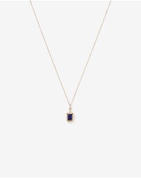 Michael Hill - Emerald Cut Created Sapphire Bezel Pendant with Chain in 10kt Yellow Gold