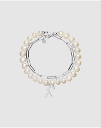 Karen Walker - Girl with the Pearls and Chain Bracelet