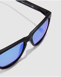 Hawkers Co - HAWKERS - Polarized Black Clear Blue ONE RAW Sunglasses for Men and Women UV400