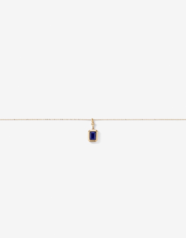 Michael Hill - Emerald Cut Created Sapphire Bezel Pendant with Chain in 10kt Yellow Gold