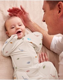 Love to Dream - Swaddle Up™ 1.0 TOG Stretch Cotton Sleepy Dinosnore Cream