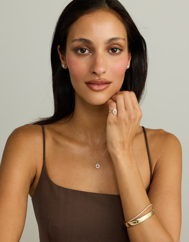 Michael Hill - Tanzanite & 0.15TW of Diamond Halo Pendant with Chain in 10kt Yellow Gold