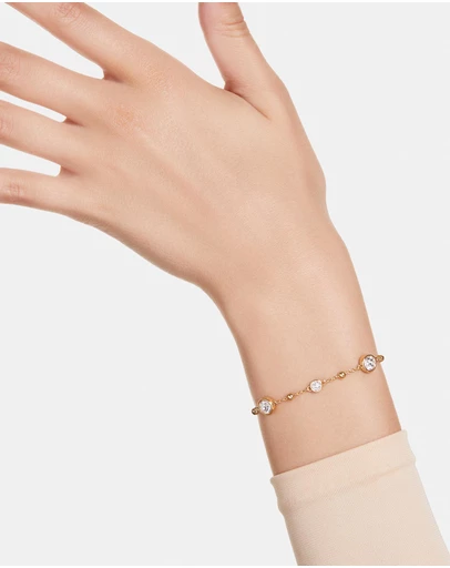 Swarovski - Imber bracelet, Round cut, Scattered design, White, 18K gold finish
