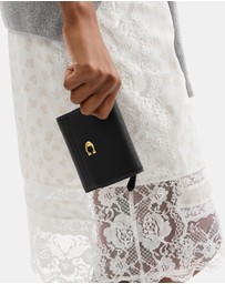 Coach - Polished Pebble Leather Mila Small Flap Wallet