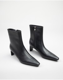 RAID - Penelope flat heeled ankle boots in black