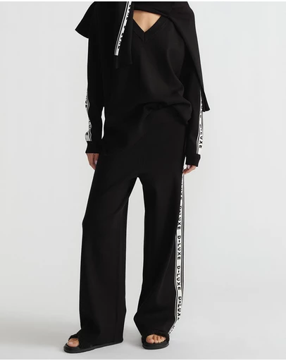 Decjuba - D-Luxe Logo Panel Knit Pants
