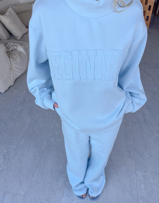 Beginning Boutique - Remy Blue Applique Mock Neck Sweater