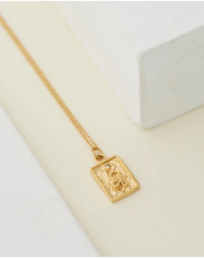 Carly Paiker - Leo Star Sign Zodiac Tag Necklace