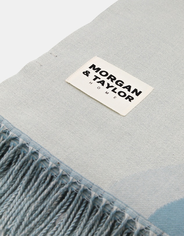 Morgan & Taylor - River Throw Blanket in Beige with a Light Blue Wave Pattern