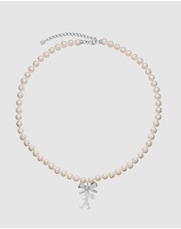 Karen Walker - Girl with a Bow & Pearl Necklace