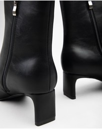 RAID - Penelope flat heeled ankle boots in black
