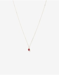 Michael Hill - Oval Cut Created Ruby and Diamond Halo Pendant Necklace in 10kt Yellow Gold