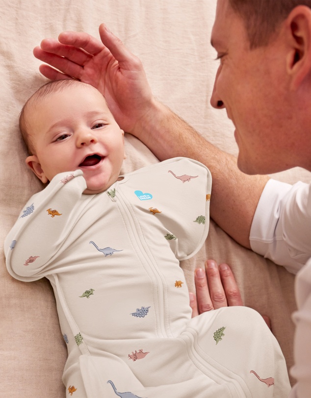 Love to Dream - Swaddle Up™ 1.0 TOG Stretch Cotton Sleepy Dinosnore Cream