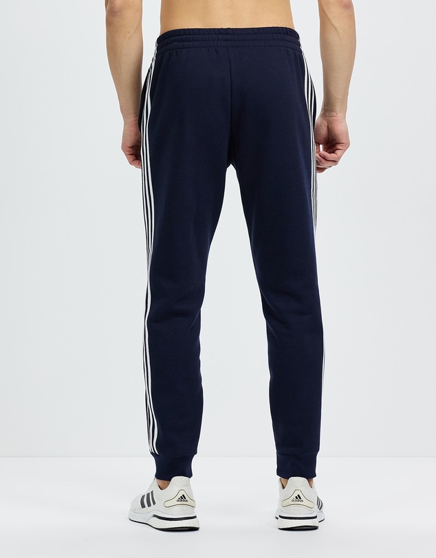 adidas Sportswear - Essentials Fleece Tapered Cuff 3-Stripes Pants