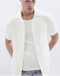 UNISON - Rib Stitch Button Thru