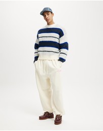 Cotton On - Super Baggy Cuffed Graphic Track Pant