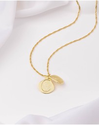 Wanderlust + Co - Seashell Gold Locket Necklace