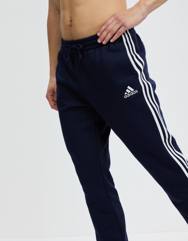 adidas Sportswear - Essentials Fleece Tapered Cuff 3-Stripes Pants