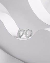 Wanderlust + Co - Jagged Baguette Silver 8mm Baby Huggie Earrings