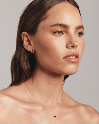 Michael Hill - Oval Cut Green Emerald Gemstone and 0.05 Carat TW Diamond Halo Necklace in 10kt Yellow Gold