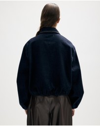 Minima Esenciales - Mara Bubble Hem Denim Bomber Jacket